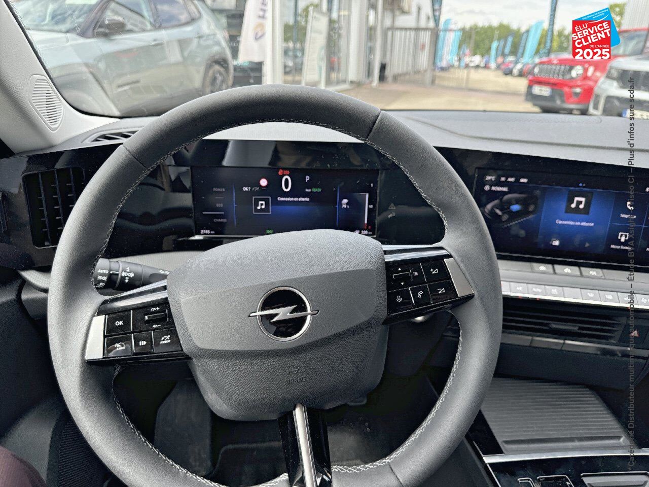 Véhicule d'occasion OPEL ASTRA SPORTS TOURER ELECTRIC 156CH chez Toyota Verdun