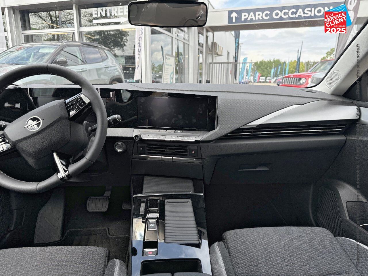 Véhicule d'occasion OPEL ASTRA SPORTS TOURER ELECTRIC 156CH chez Toyota Verdun