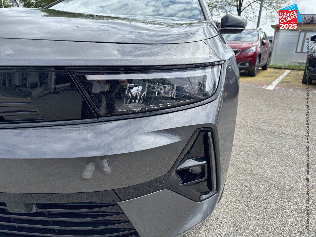 Véhicule d'occasion OPEL ASTRA SPORTS TOURER ELECTRIC 156CH chez Toyota Verdun