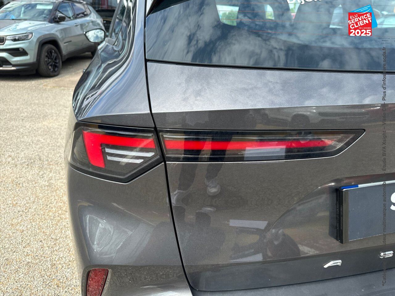Véhicule d'occasion OPEL ASTRA SPORTS TOURER ELECTRIC 156CH chez Toyota Verdun