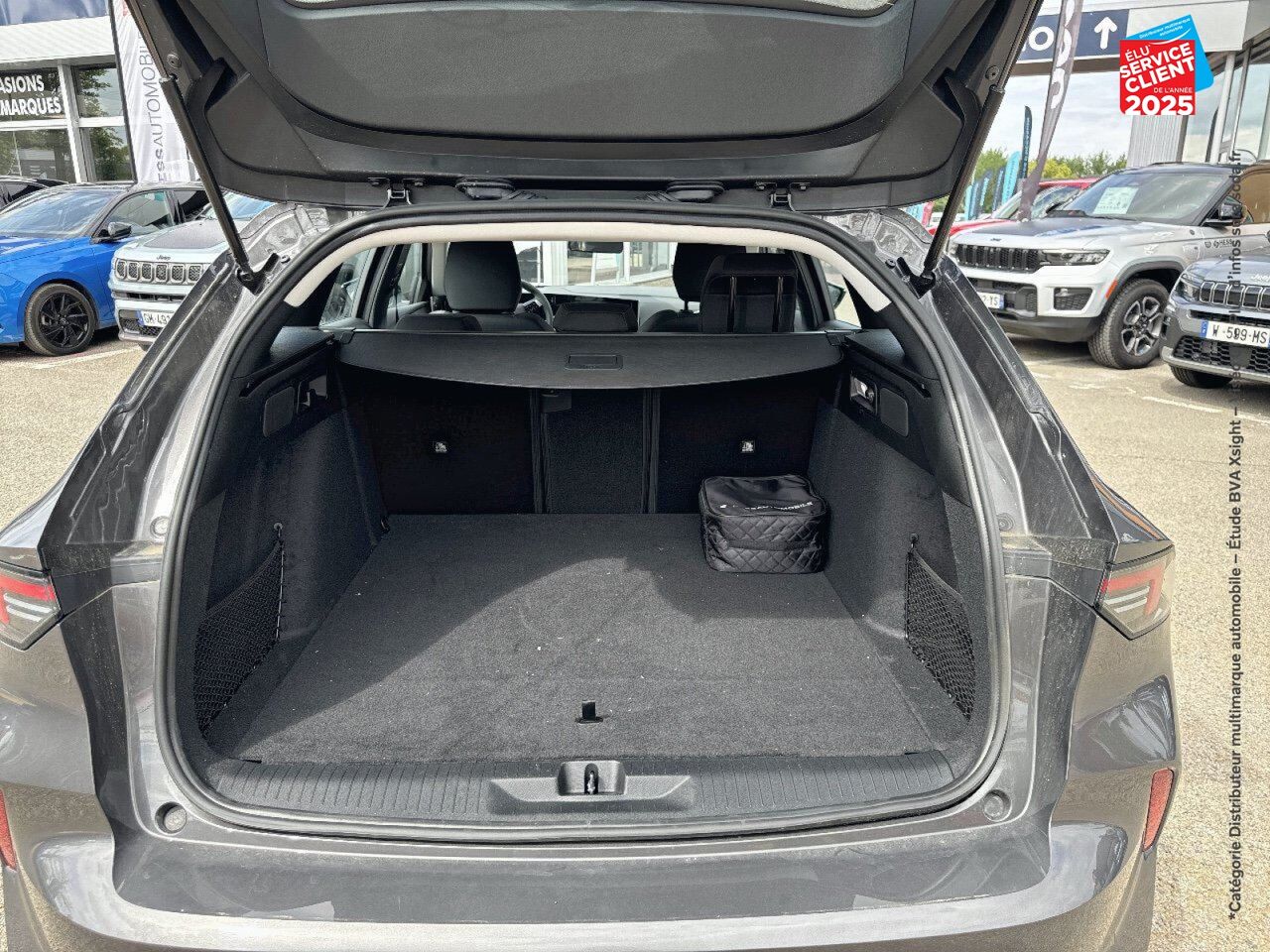 Véhicule d'occasion OPEL ASTRA SPORTS TOURER ELECTRIC 156CH chez Toyota Verdun