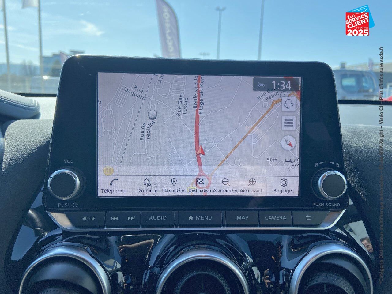 Véhicule d'occasion NISSAN JUKE 1.6 HYBRID 143CH N-DESIGN 2022.5 SIEGES CHAUF GPS CAMERA CARPLAY chez Renault Belfort