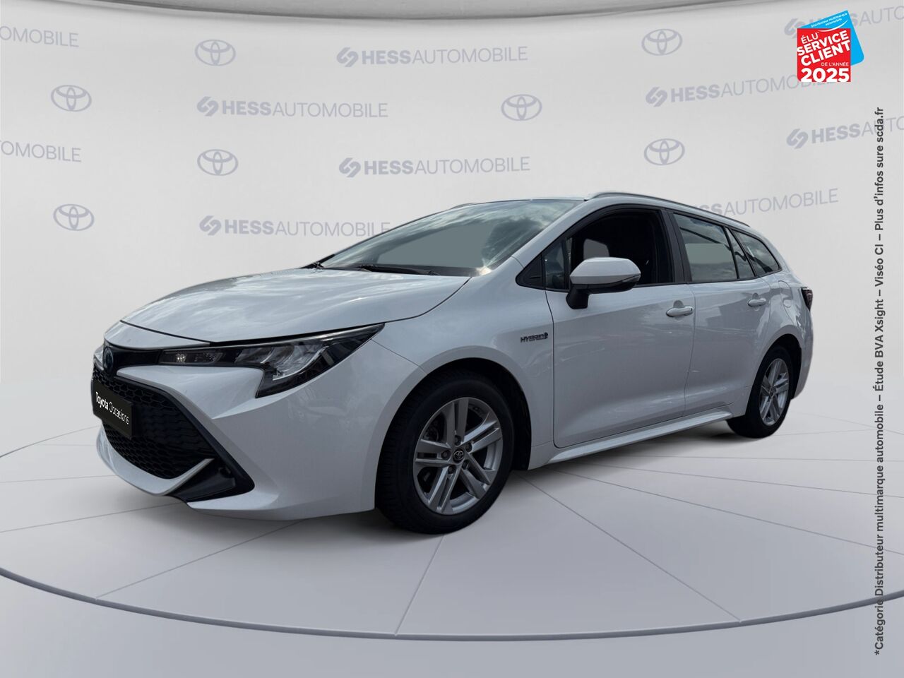 Véhicule d'occasion TOYOTA COROLLA TOURING SPT 122H DYNAMIC BUSINESS SIEGES CHAUF GPS CAMERA chez Toyota Besançon