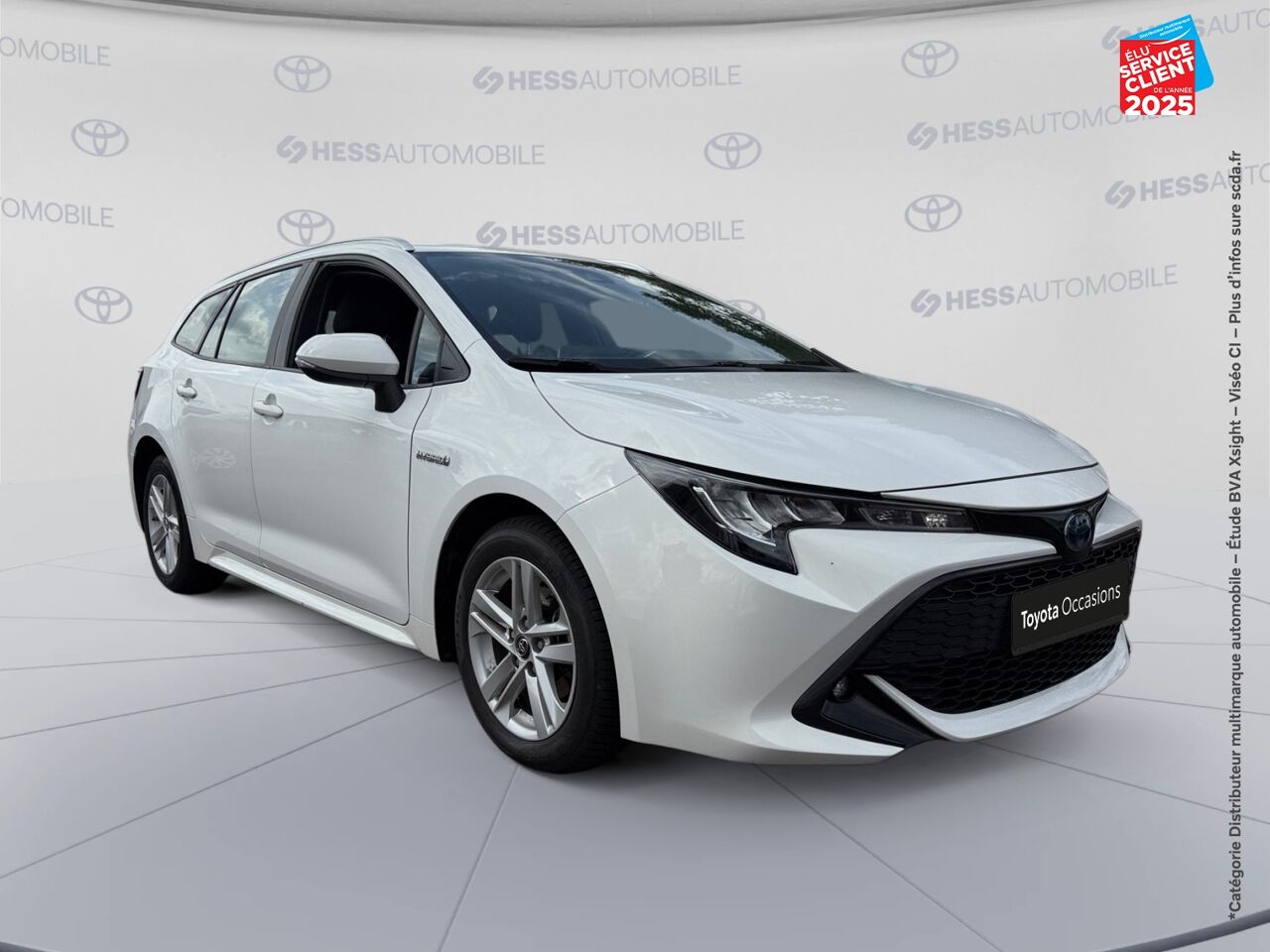 Véhicule d'occasion TOYOTA COROLLA TOURING SPT 122H DYNAMIC BUSINESS SIEGES CHAUF GPS CAMERA chez Toyota Besançon