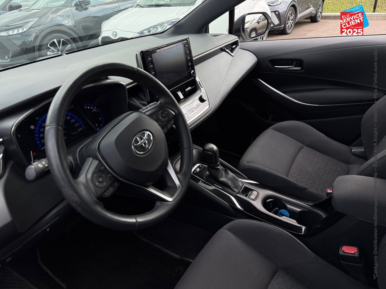 Véhicule d'occasion TOYOTA COROLLA TOURING SPT 122H DYNAMIC BUSINESS SIEGES CHAUF GPS CAMERA chez Toyota Besançon