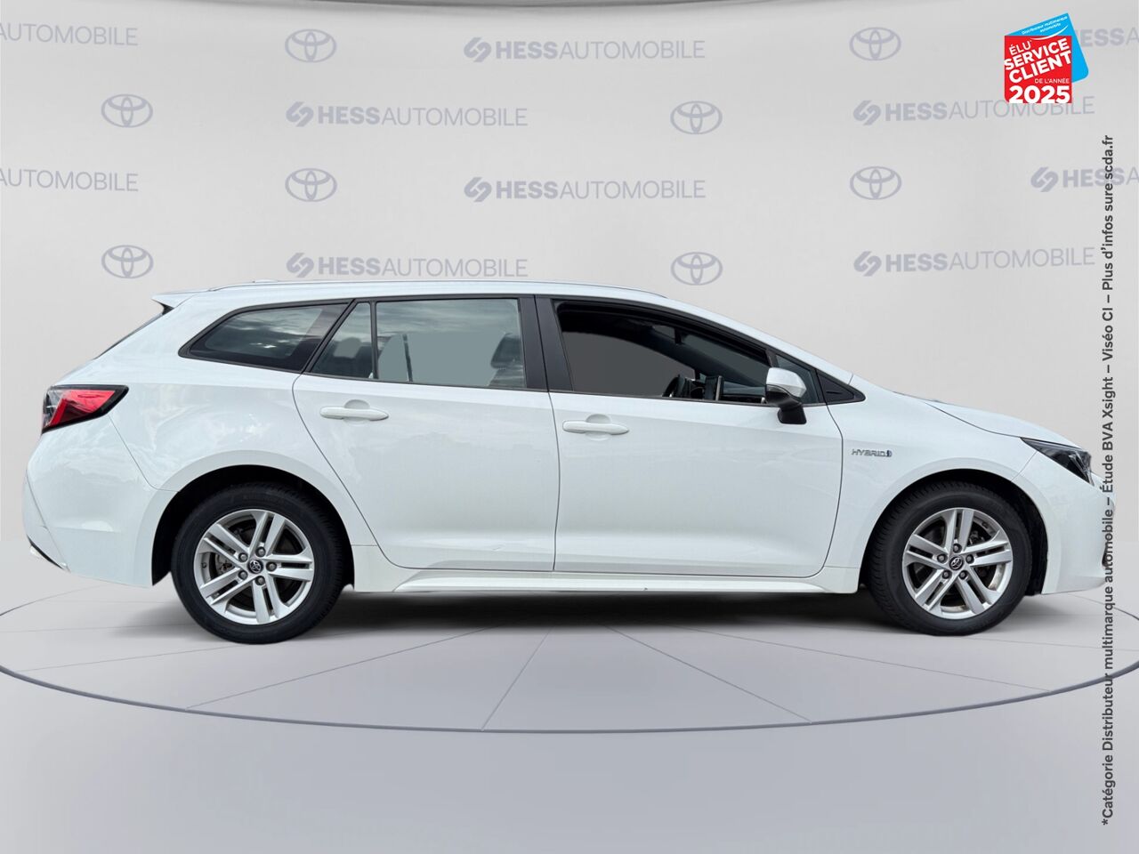 Véhicule d'occasion TOYOTA COROLLA TOURING SPT 122H DYNAMIC BUSINESS SIEGES CHAUF GPS CAMERA chez Toyota Besançon