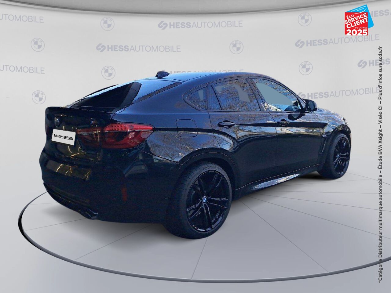 Véhicule d'occasion BMW X6 M 575CH BVA8 TOUVRANT SIEGES CHAUF/CUIR CAMERA H/KARDON HUD chez BMW Besançon