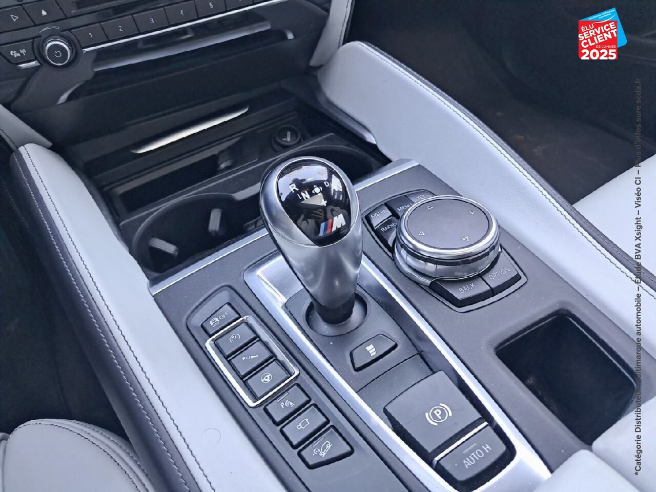 Véhicule d'occasion BMW X6 M 575CH BVA8 TOUVRANT SIEGES CHAUF/CUIR CAMERA H/KARDON HUD chez BMW Besançon