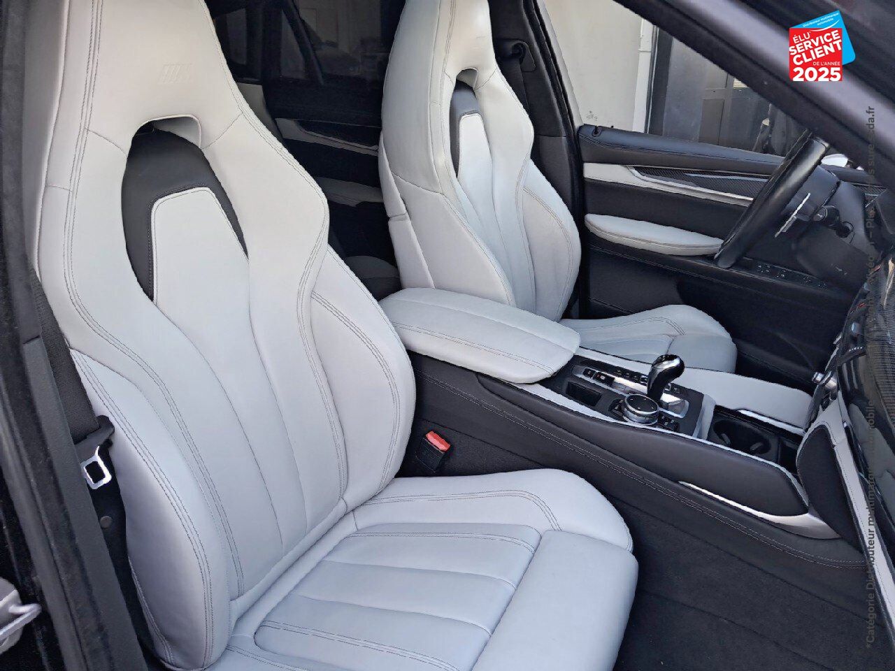 Véhicule d'occasion BMW X6 M 575CH BVA8 TOUVRANT SIEGES CHAUF/CUIR CAMERA H/KARDON HUD chez BMW Besançon