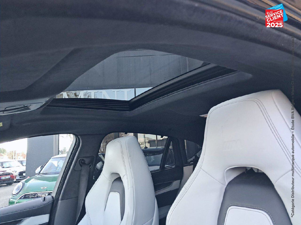 Véhicule d'occasion BMW X6 M 575CH BVA8 TOUVRANT SIEGES CHAUF/CUIR CAMERA H/KARDON HUD chez BMW Besançon