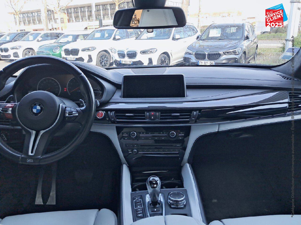 Véhicule d'occasion BMW X6 M 575CH BVA8 TOUVRANT SIEGES CHAUF/CUIR CAMERA H/KARDON HUD chez BMW Besançon