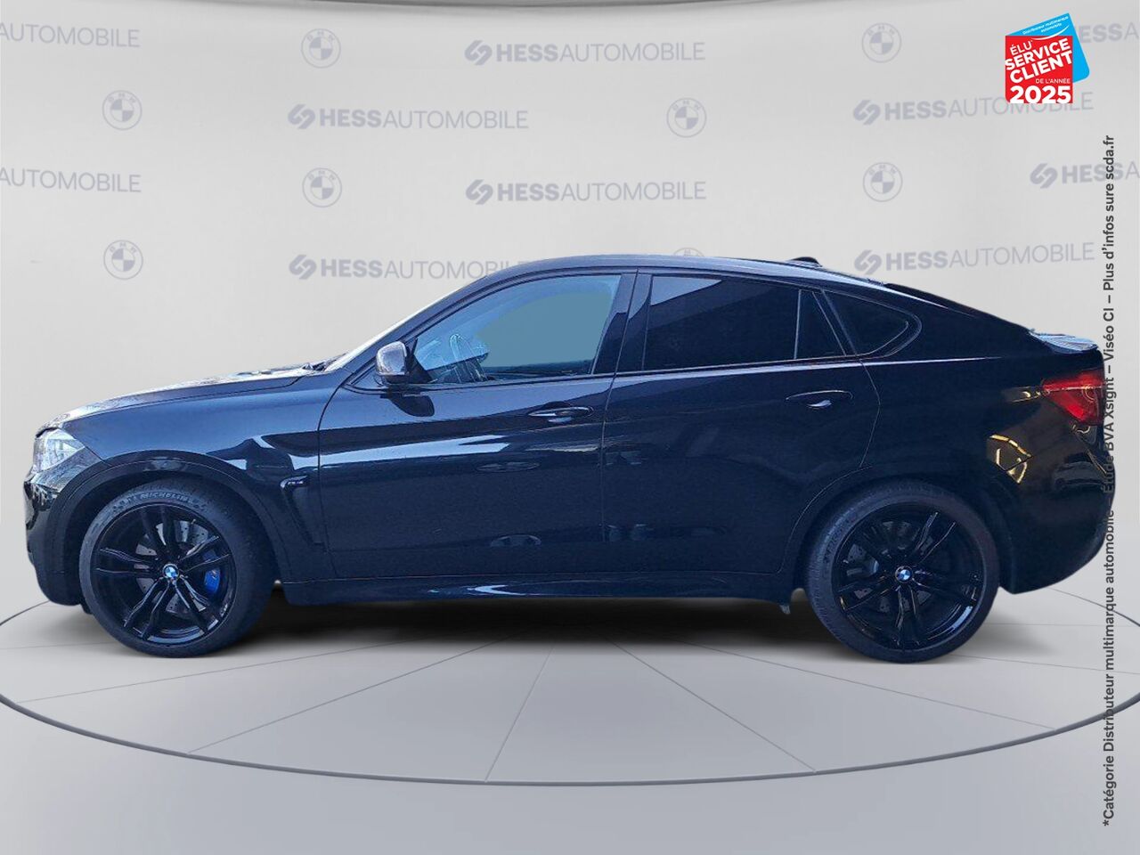 Véhicule d'occasion BMW X6 M 575CH BVA8 TOUVRANT SIEGES CHAUF/CUIR CAMERA H/KARDON HUD chez BMW Besançon