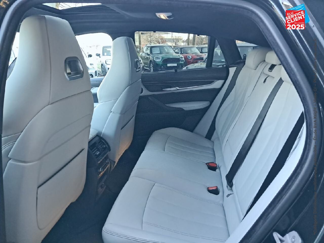 Véhicule d'occasion BMW X6 M 575CH BVA8 TOUVRANT SIEGES CHAUF/CUIR CAMERA H/KARDON HUD chez BMW Besançon