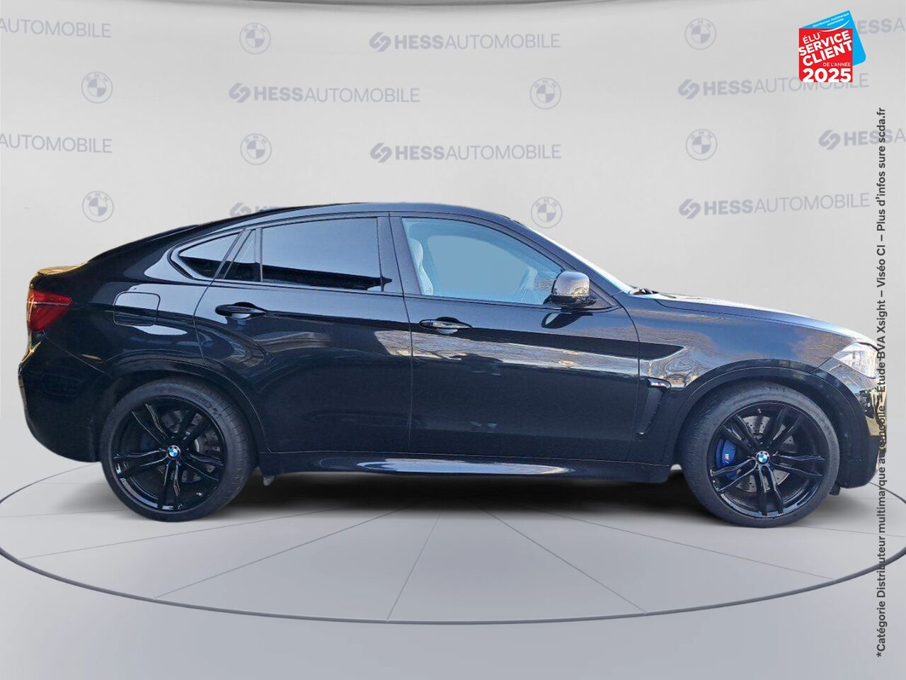Véhicule d'occasion BMW X6 M 575CH BVA8 TOUVRANT SIEGES CHAUF/CUIR CAMERA H/KARDON HUD chez BMW Besançon