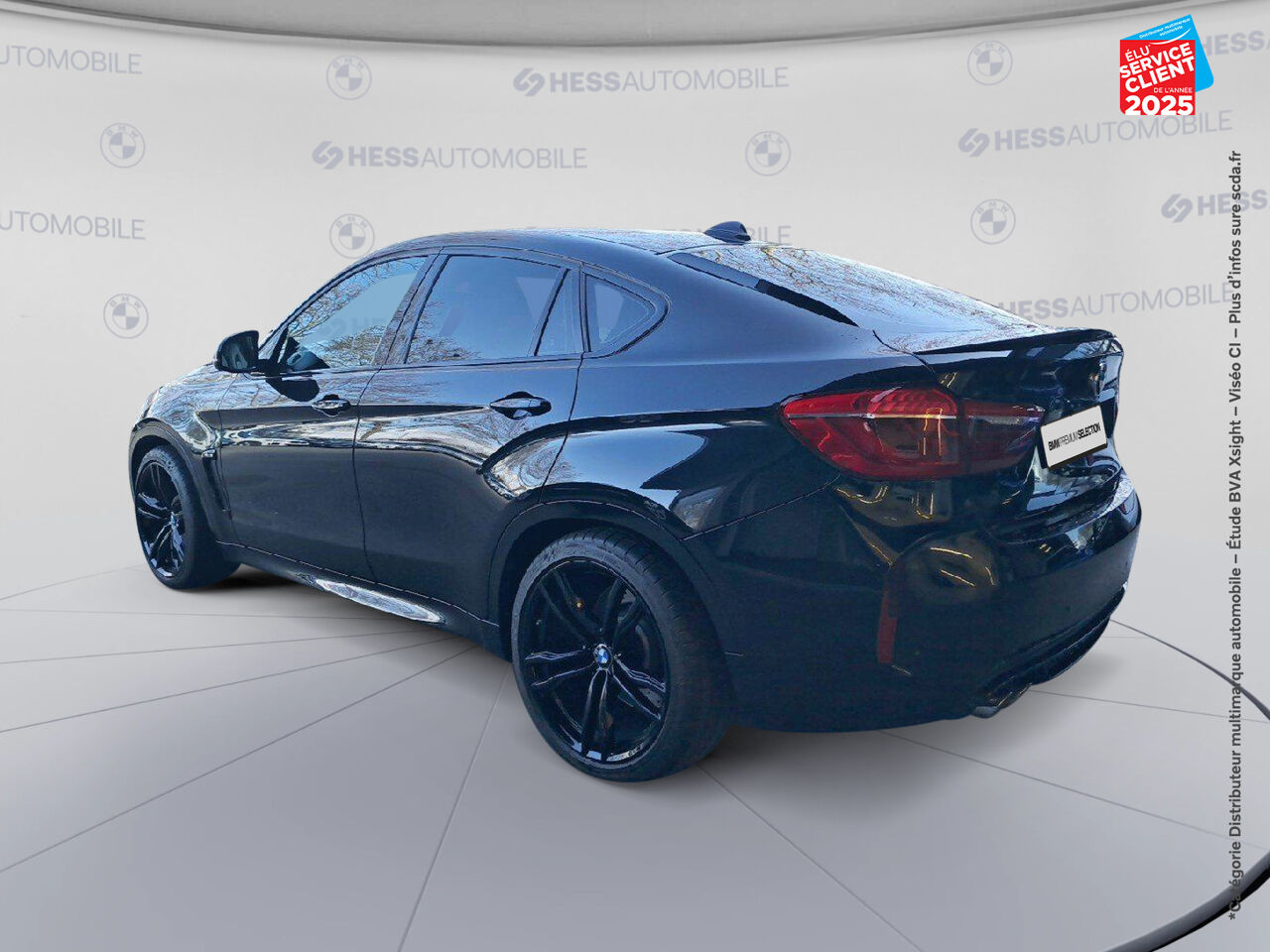 Véhicule d'occasion BMW X6 M 575CH BVA8 TOUVRANT SIEGES CHAUF/CUIR CAMERA H/KARDON HUD chez BMW Besançon