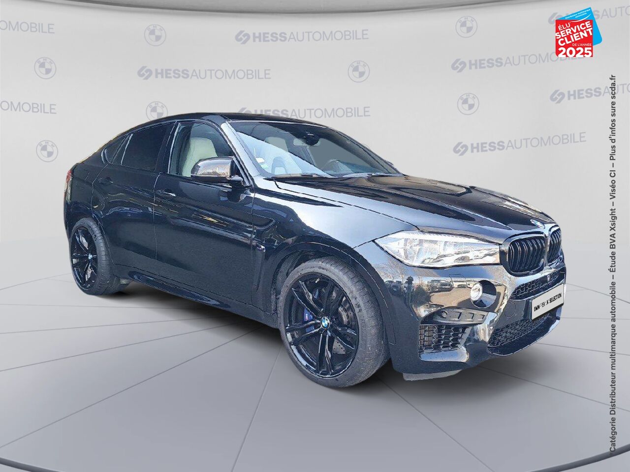 Véhicule d'occasion BMW X6 M 575CH BVA8 TOUVRANT SIEGES CHAUF/CUIR CAMERA H/KARDON HUD chez BMW Besançon