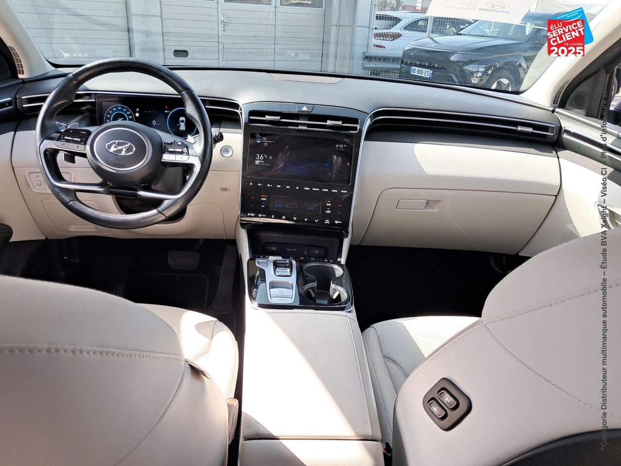 Véhicule d'occasion HYUNDAI TUCSON 1.6 T-GDI 230 CH HYBRID EXECUTIVE TOUVRANT SIEGE CHAUF VENTIL VOLANT CHAUF CAMERA GPS chez Hyundai Epernay