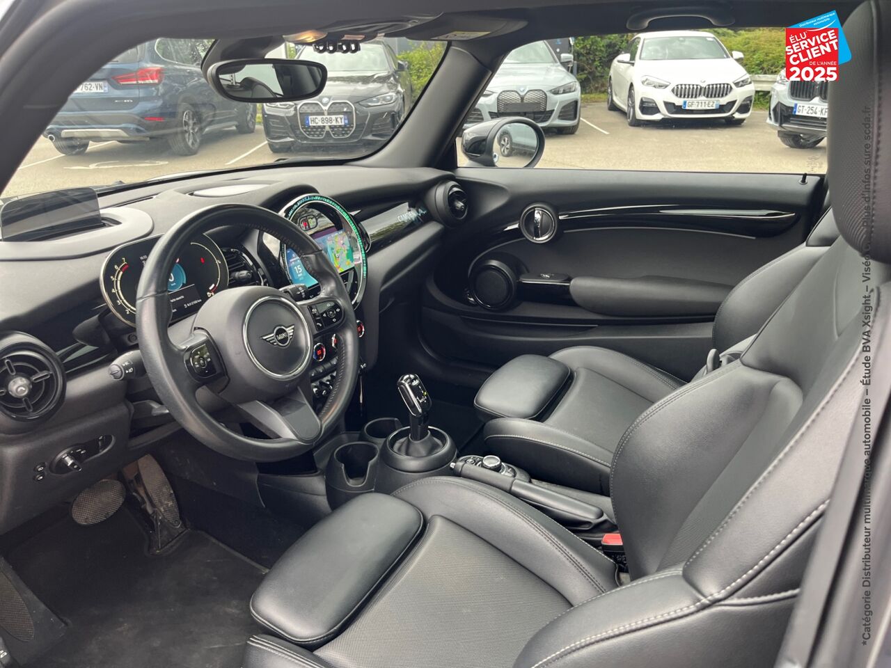 Véhicule d'occasion MINI MINI COOPER 136CH EDITION CAMDEN BVA7 TOUVRANT SIEGES CHAUF/CUIR GPS RADAR AV/AR HUD chez BMW Pontarlier