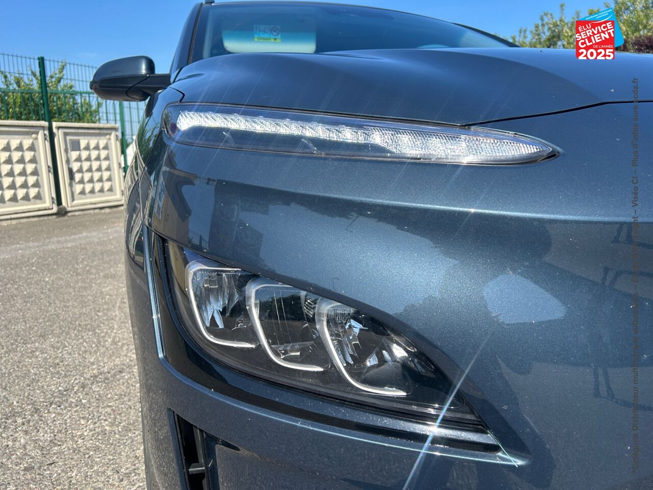 Véhicule d'occasion HYUNDAI KONA ELECTRIC 64KWH - 204CH CREATIVE CAMERA chez Renault Saint-Louis