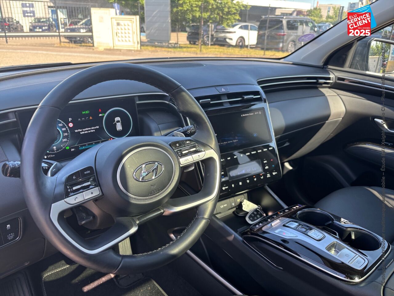Véhicule d'occasion HYUNDAI TUCSON 1.6 T-GDI 230CH HYBRID EXECUTIVE BVA6 TOUVRANT SIEGES CHAUF/VENTIL/CUIR VOLANT CHAUF GPS chez Toyota Saint Dizier