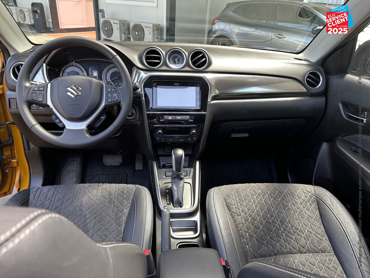 Véhicule d'occasion SUZUKI VITARA 1.4 BOOSTERJET HYBRID 129CH STYLE AUTO TOUVRANT chez Opel Saint-Dizier