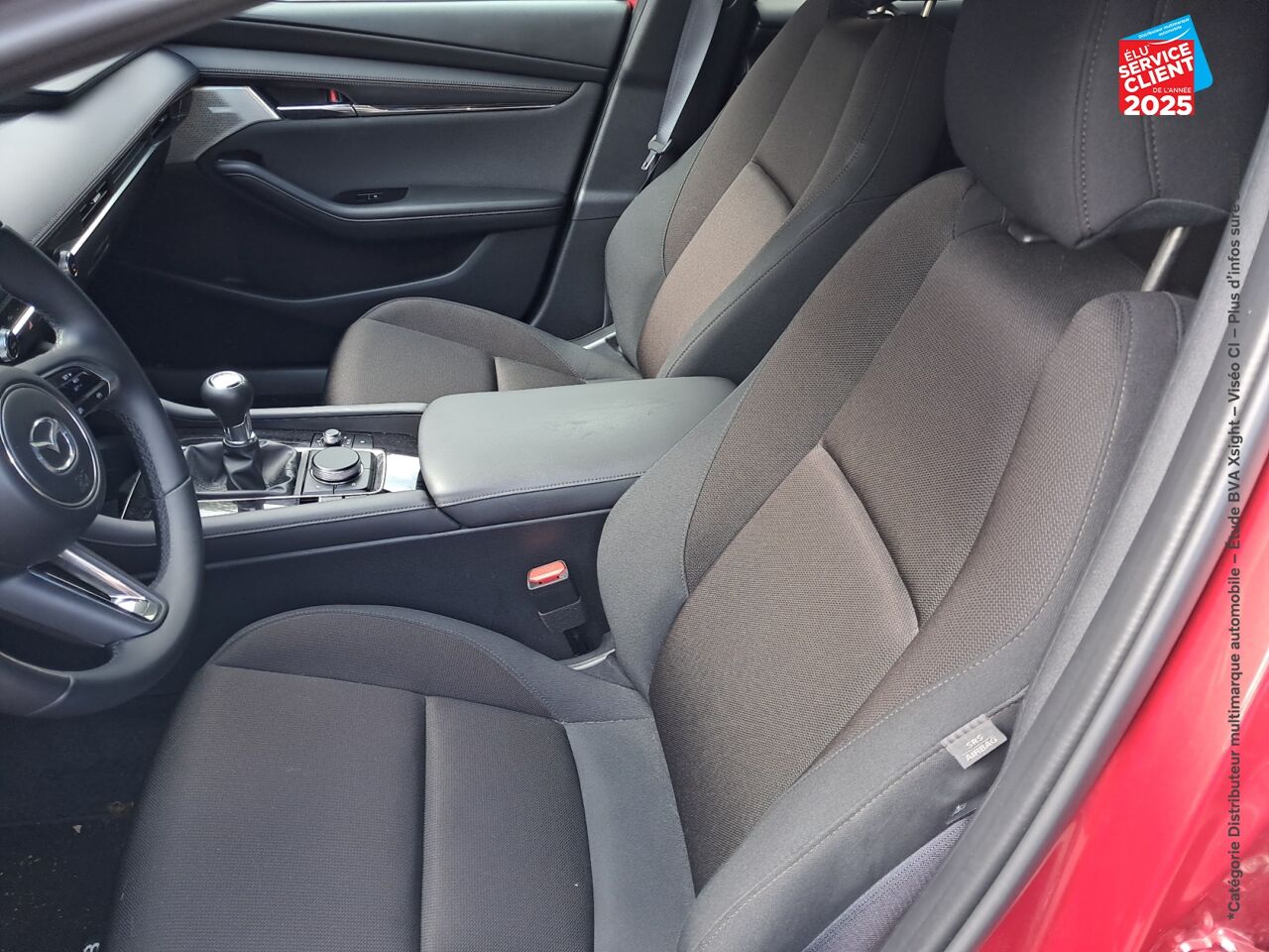 Véhicule d'occasion MAZDA MAZDA 3 2.0 E-SKYACTIV-G M-HYBRID 150CH EXCLUSIVE LINE 2024 chez Toyota Bar le Duc