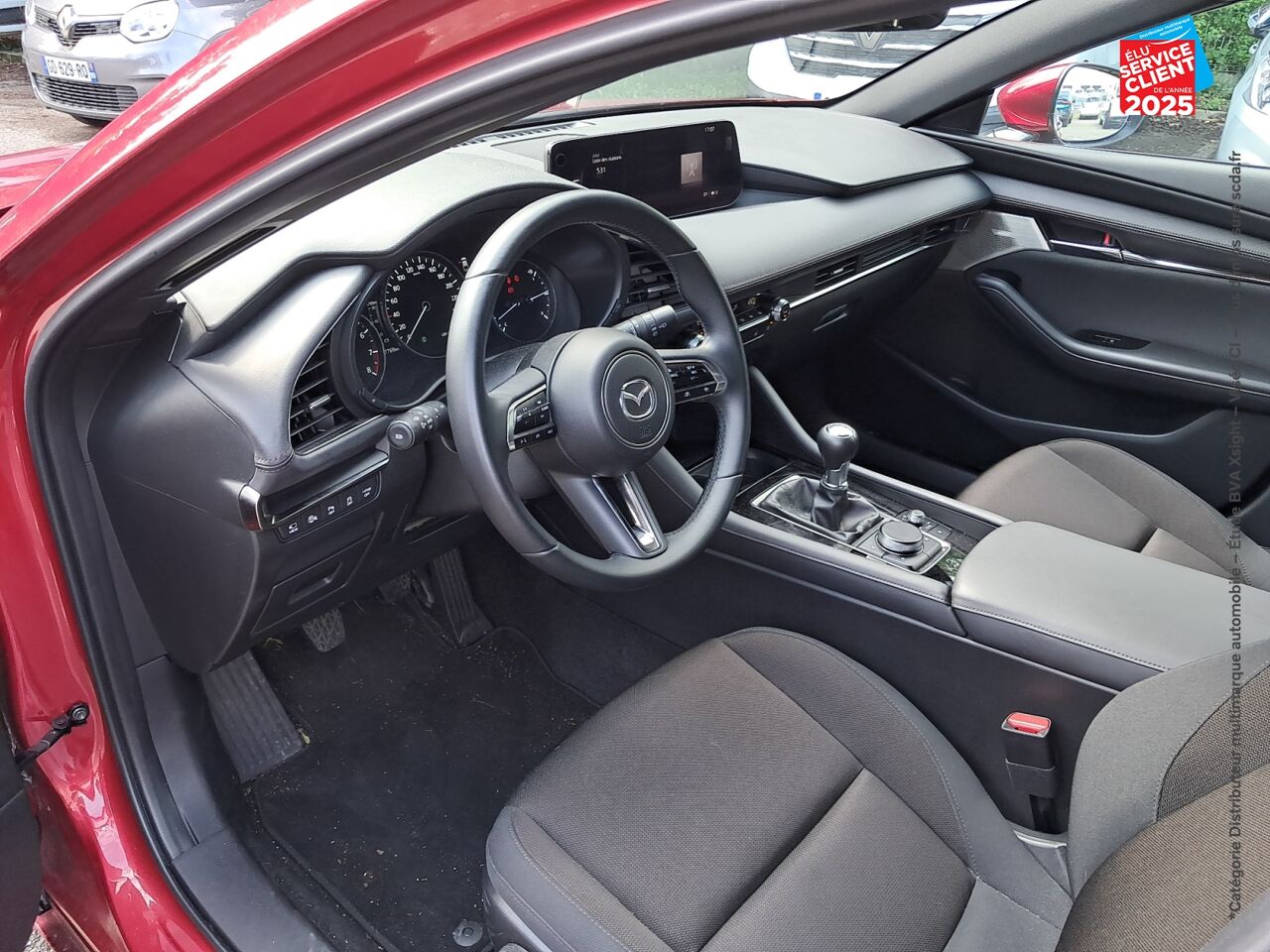 Véhicule d'occasion MAZDA MAZDA 3 2.0 E-SKYACTIV-G M-HYBRID 150CH EXCLUSIVE LINE 2024 chez Toyota Bar le Duc
