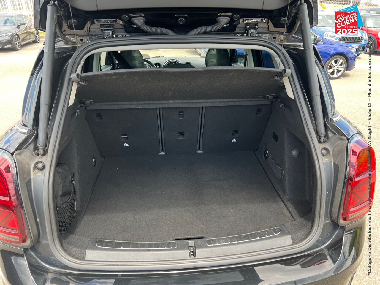 Véhicule d'occasion MINI COUNTRYMAN COOPER SE 136CH + 88CH EXQUISITE ALL4 BVA TPANO SIEGES CHAUF/CUIR chez MINI Besançon