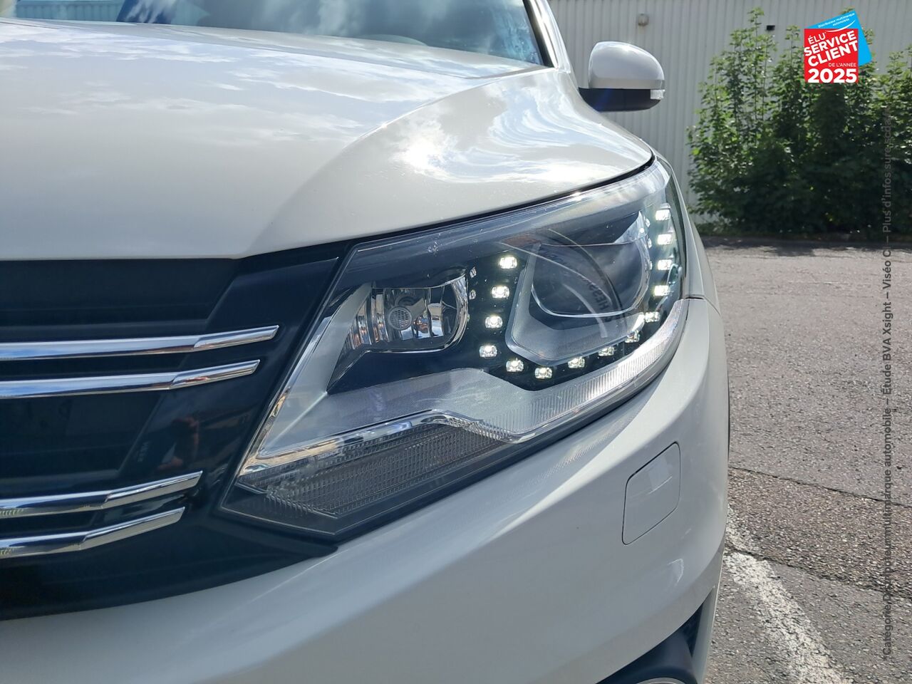 Véhicule d'occasion VOLKSWAGEN TIGUAN 2.0 TDI 140CH BLUEMOTION TECHNOLOGY FAP CARAT 4MOTION DSG7 SIEGES CUIR GPS CAMERA chez Primocar
