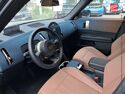 Véhicule d'occasion MINI COUNTRYMAN C 170CH FAVOURED DKG7 TOUVRANT SIEGES CHAUF/CUIR VOLANT CHAUF GPS HUD H/KARDON