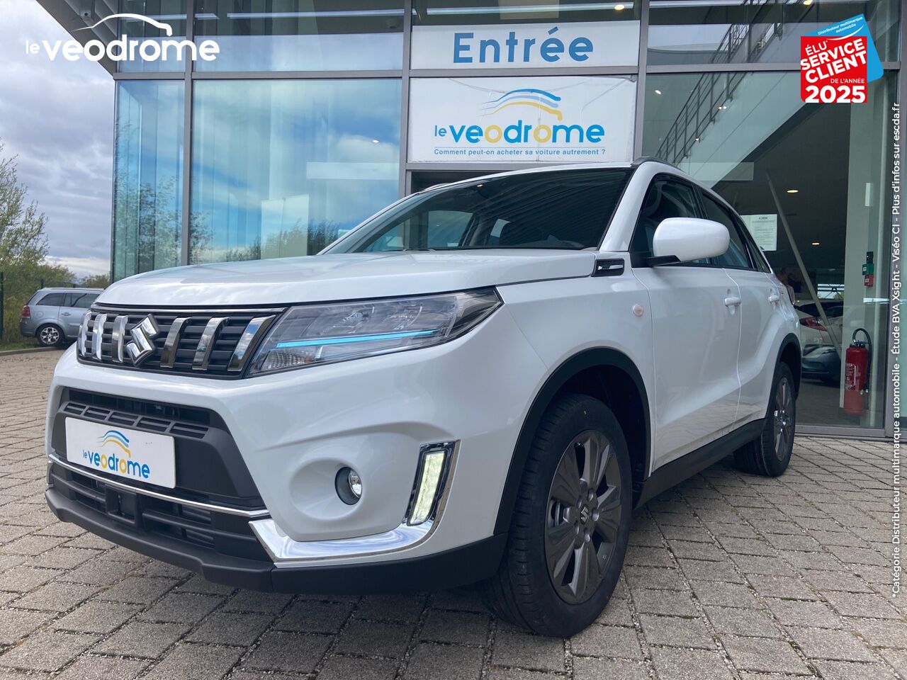 Véhicule d'occasion SUZUKI VITARA 1.4 BOOSTERJET HYBRID 129CH PRIVILEGE -20 CAM APPLE CARPLAY/ANDROIDAUTO LED SIEGES CHAUF chez Le Veodrome