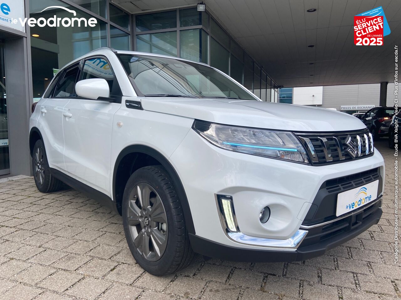 Véhicule d'occasion SUZUKI VITARA 1.4 BOOSTERJET HYBRID 129CH PRIVILEGE -20 CAM APPLE CARPLAY/ANDROIDAUTO LED SIEGES CHAUF chez Le Veodrome