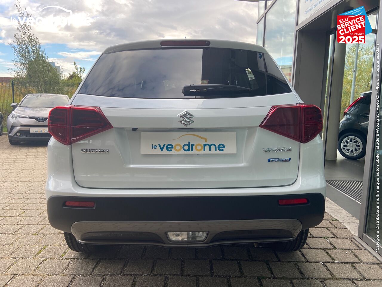 Véhicule d'occasion SUZUKI VITARA 1.4 BOOSTERJET HYBRID 129CH PRIVILEGE -20 CAM APPLE CARPLAY/ANDROIDAUTO LED SIEGES CHAUF chez Le Veodrome