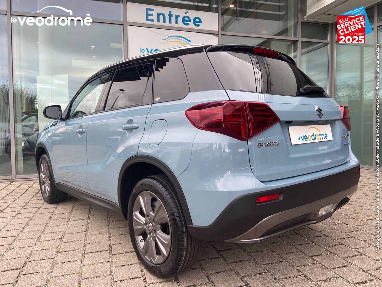 Véhicule d'occasion SUZUKI VITARA 1.4 BOOSTERJET HYBRID 129CH PRIVILEGE -22 CAMERA APPLE CARPLAY/ANDROIDAUTO LED SIEGE CHAUF chez Le Veodrome